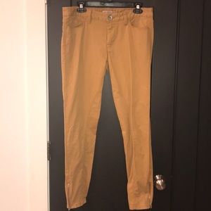 Mustard-colored Banana Republic Heritage jeans.